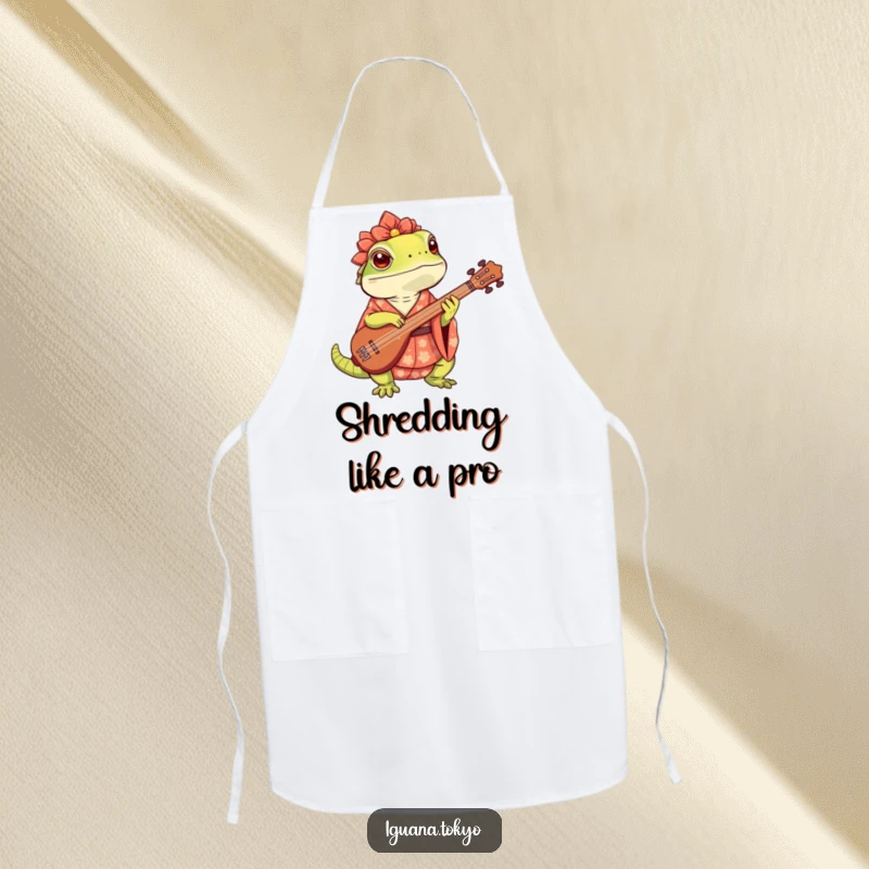 Funny Apron featuring a cute iguana in a kimono, energetically playing a shamisen while cooking, adding musical fun to the kitchen.