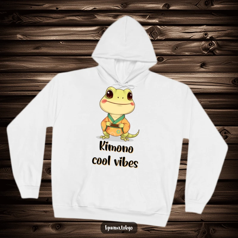 Funny hoodie with a smiling iguana character elegantly dressed in a colorful kimono, offering warmth and style.