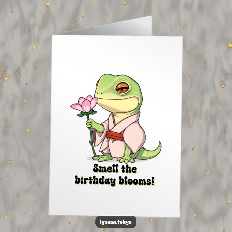 Funny Free Printable Birthday Card: Iguana in a kimono curiously examining a flower, looking fascinated.